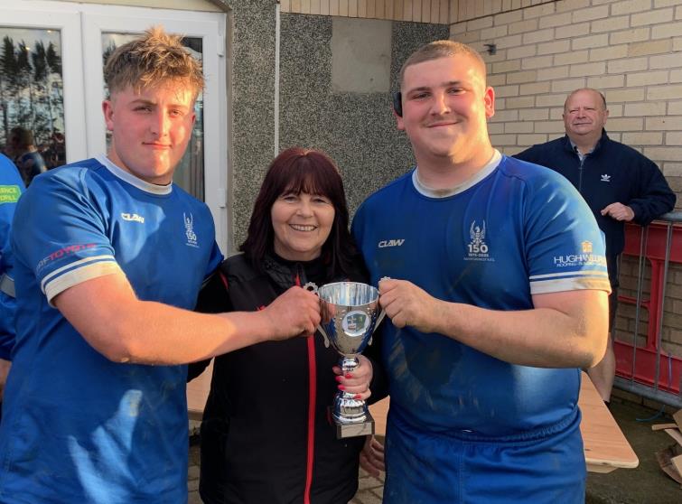 Haverfordwest Co-Captains Devin Williams and Iori Curtis with Delyth Summons and Ken Davies